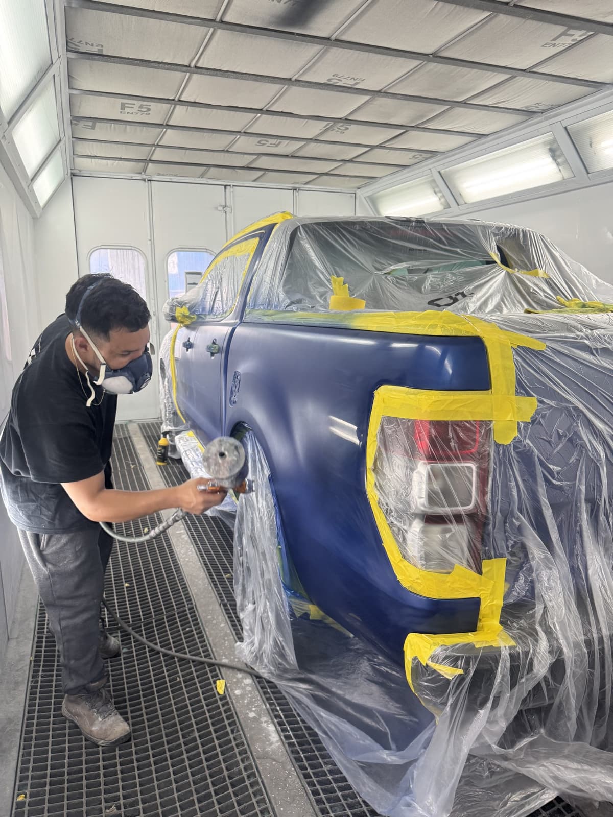 Mechanic working on a car
